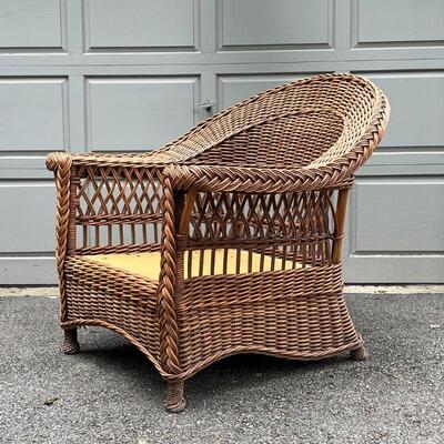 PALECEK WICKER ARM CHAIR | Appears in excellent condition, no cushion; h. 37 x 37 x 37 in.