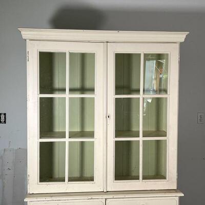 COUNTRY PAINTED CABINET | Double glazed doors over two drawers and cabinet doors, white paint with green painted interior; h. 76 x 43-1/2...