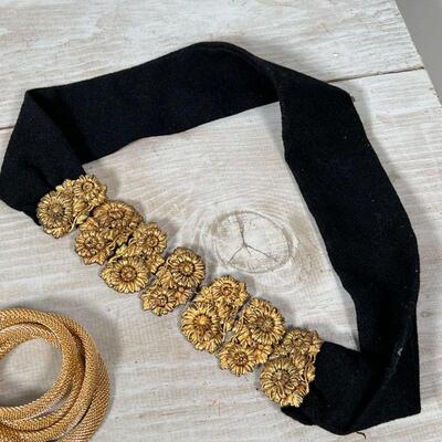 COSTUME JEWELRY | Including a snake-form necklace, a choker, gold-toned bracelets, a lucky four leaf clover pin, etc.