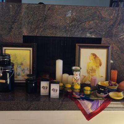 Several pieces of art and candles..
