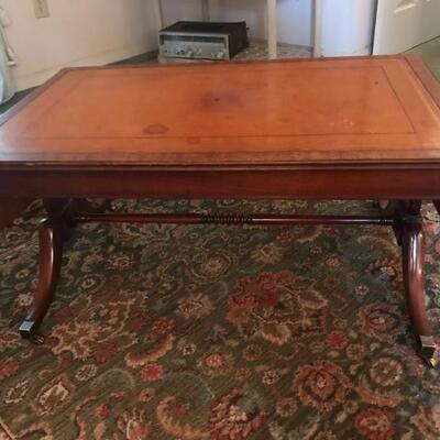 leather top coffee table $185
36 X 22 X 18"
2 leaves 8" each