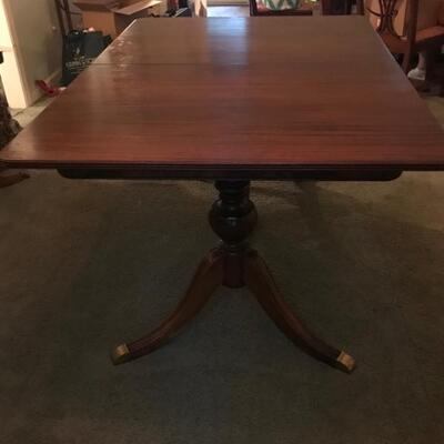 Van Dyk Furniture dining table 395
42 X 62 X 30"
2 leaves @ 8 1/2" each