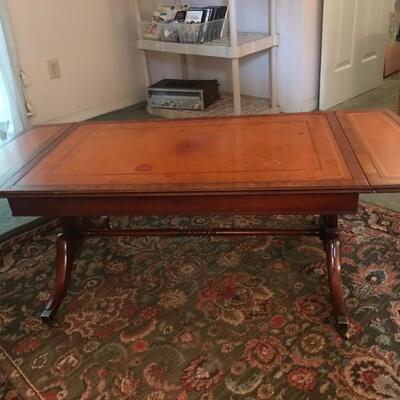 leather top coffee table $185
36 X 22 X 18"
2 leaves 8" each