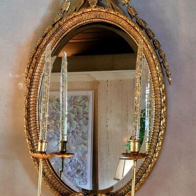 One of a pair of gold gilt French style mirrors