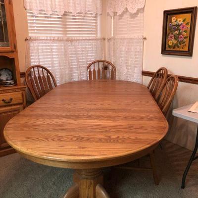Long oak dining table - one more leaf!