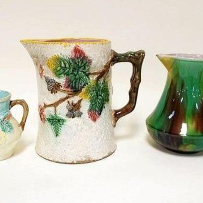 1089	GROUP OF 5 ANTIQUE MAJOLICA PITCHERS & CREAMERS, 2 SMALL SPOUT CHIPS ON CREAMER, TENUOUS MAJOLICA, TALLEST IS APPROXIMATELY 9 IN...