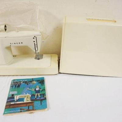 1056	SINGER MIDCENTURY MODERN 1960'S SEWING MACHINE W/ORIGINAL INSTRUCTIONS
