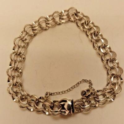 https://www.ebay.com/itm/115540807692	RAB3048 VINTAGE 7 INCH ELCO STERLING SILVER CHARM BRACELET

