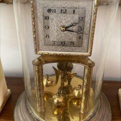 https://www.ebay.com/itm/125528284469	NW1022 GERMAN CLOCK KIENINGER & OBERGFELL WITH GLASS DOME 
