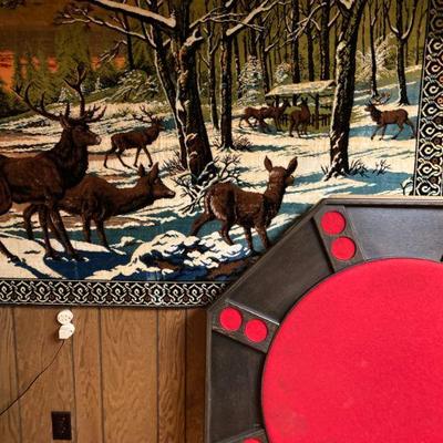 poker table and large tapestry