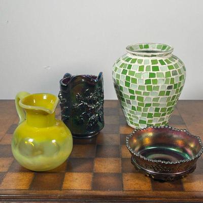(4pc) ASSORTMENT OF GLASS PIECES  |  An iridescent pitcher, pressed glass iridescent dish, a stained glass vase, and a yellow glass...