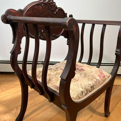 ANTIQUE ARM CHAIR  |  Carved reserve, needlepoint seat - l. 19 x w. 25 x h. 35 in.