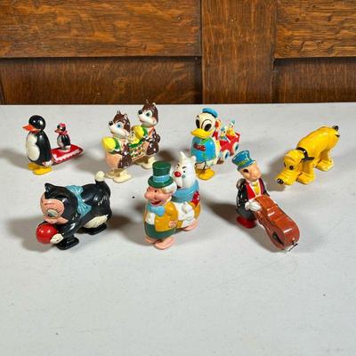 (7pc) GROUP PLASTIC DISNEY WALKING TOYS  