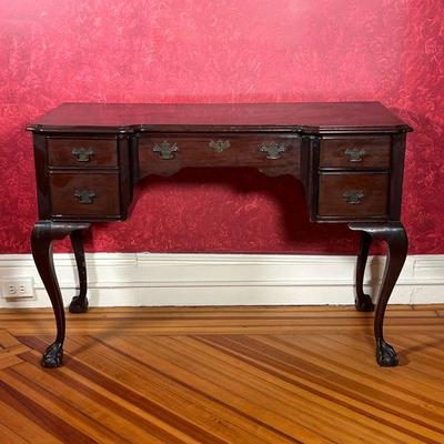 DRESSING TABLE  |  Queen Anne style vanity table, with two banks of drawers centering a single drawer, on cabriole legs terminating in...