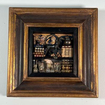 ZACARIA'S MINIATURE BOOKSHELF  |  Shadowbox frame decorated with miniature books, scrolls, a bronze horse glassware, framed prints...