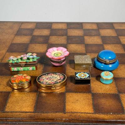 (8pc) LIMOGES BOXES  |  Small Limoges pill / trinket boxes, many with porcelain, one with needlepoint, and one of metal, possibly silver
