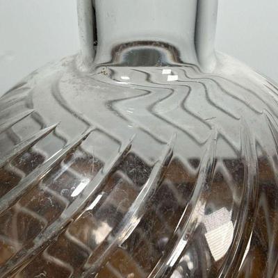 BACCARAT VASE  |  Crystal glass vase of bulbous form with smooth cut ribbed swirls, signed on the bottom - h. 9.5 x dia. 7 in.
