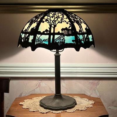 SLAG GLASS TABLE LAMP  |  Formed brass or other metal over a milky blue / white glass shade with a repeating chinoiserie pattern of a...