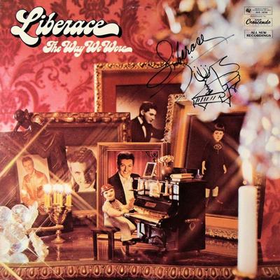 Liberace signed album