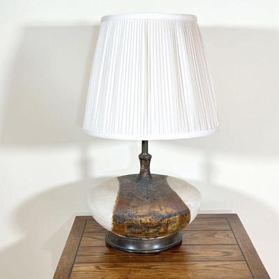 LARGE STONEWARE LAMP  |  
Heavy! Bulbous stoneware pottery table lamp, with a wide round base, apparently unsigned - h. 31 x dia. 18.25...