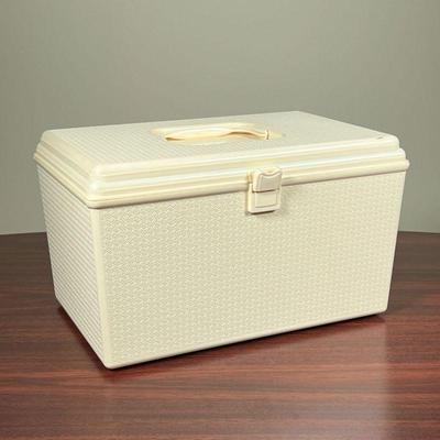 SEWING BOX & SUPPLIES  |
An extensive collection of sewing supplies including threads buttons needles and more - l. 14 x w. 9 x h....