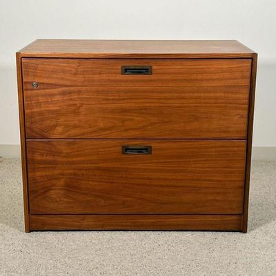 Attr. RISOM WALNUT VENEERED FILING CABINET | Attributed to Jens Risom,  two full width drawers with brass pulls, lock with piece of key...