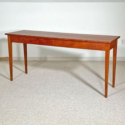 THOMAS MOSER SIDE TABLE  |
C. 1990, solid wood, with confirming glass top, signed by maker and dated on underside - l. 60 x w. 18 x h. 28...