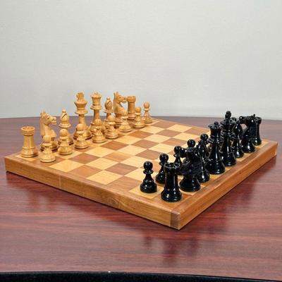 CHESS SET  |
Chess board and box of pieces Box labeled Au Nain Bleu, one complete set plus extra sets of pawns - l. 13 x w. 13 x h. 1 in.