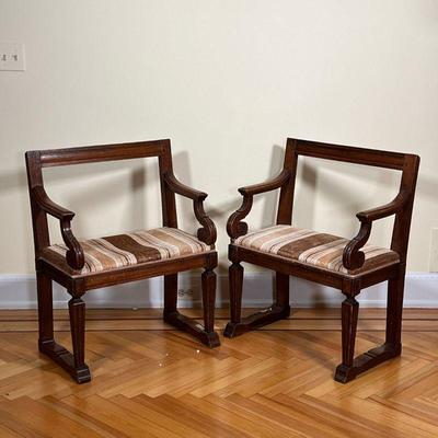 PAIR CARVED BENCHES  |  
Carved wood benches of small size, with armrests and open back, with striped velvet upholstered seats - l. 24.75...