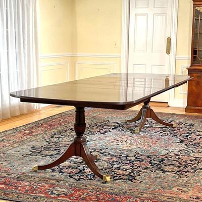 KINDEL FLAME MAHOGANY DINING TABLE  |  
"Oxford" double pedestal dining table, with beautiful highly figured and well matched...