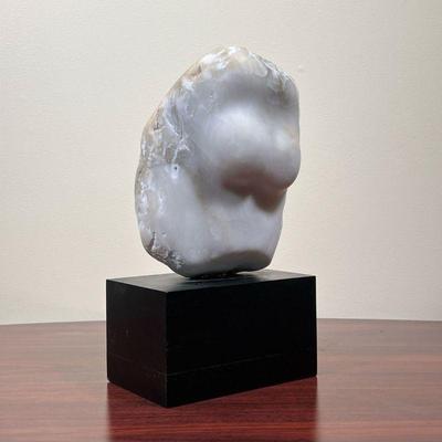 CARVED STONE FIGURE  |  
Probably alabaster or soapstone, no apparent signature; overall height 13 in. - l. 7.5. x w. 5 x h. 9 in. (stone)
