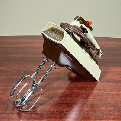 SUNBEAM HAND MIXER  |
Five speed mixer with attachments