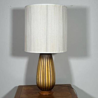 BULBOUS CERAMIC LAMP  | 
Gadrooned pattern ceramic on a turned wood base no apparent signature - h. 36 x dia. 18 in. (Over shade)
