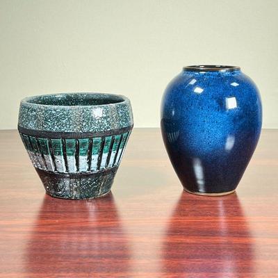 (2pc) POTTERY VASES  |
Pretty! One having a dark blue glaze (h. 5 1/2 in.), and one having green and white details (dia. 4 1/2 in.)