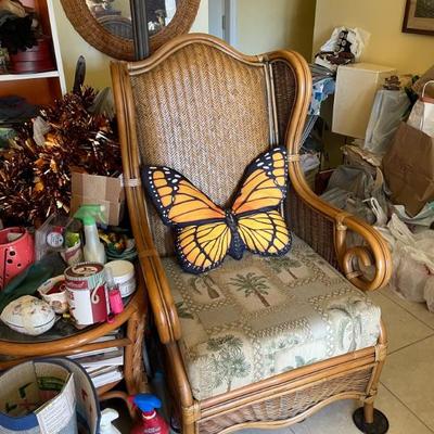 Gorgeous rattan armchair with palm tree cushions 