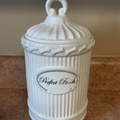 white canister 