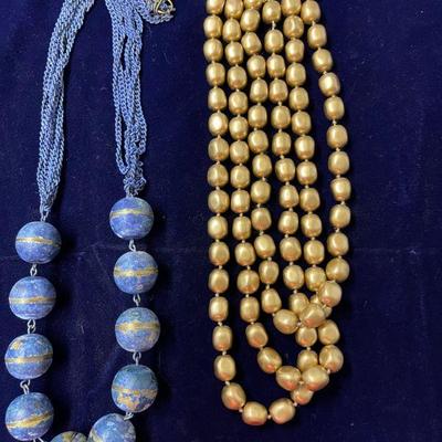 chunky metal blue bead necklace and gold bead multi strand necklace