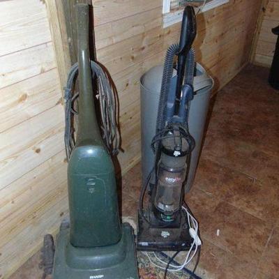 two upright vacuum cleaners
