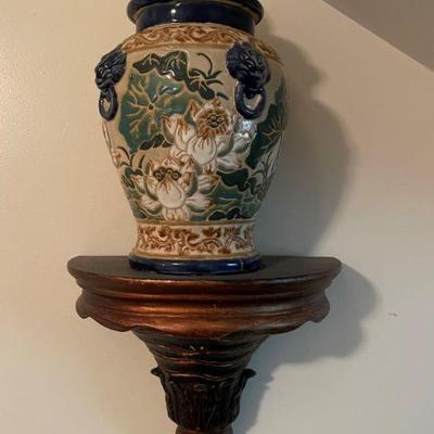 urn and wall shelf
