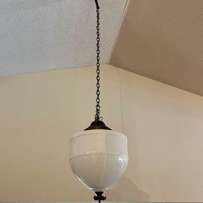 Large Schoolhouse type white glass pendant light with iron tassle