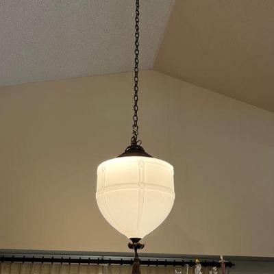 Large Schoolhouse type white glass pendant light with iron tassle