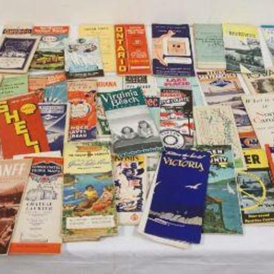 1100	LARGE LOT OF VINTAGE ROAD MAPS
