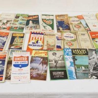 1099	LARGE LOT OF VINTAGE ROAD MAPS
