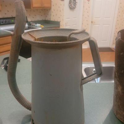 Very old oil dispenser with flexible spout