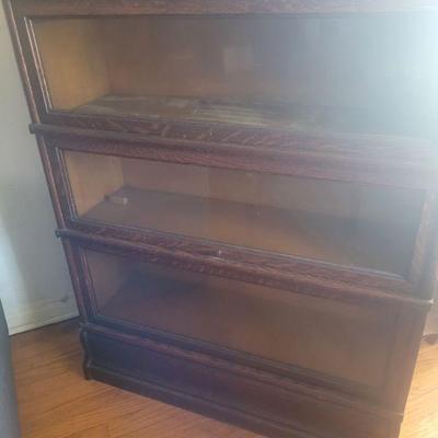 Glass front, three shelf cabinet