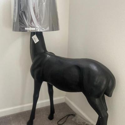 Pair of deer floor lamps, one has slight damage 