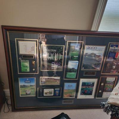THIS PICTURE IS OF GOLF MEMORABILLA OF THE 4 MAJOR PGA MATCHES IN 2000.--INCLUDES "TIGERS WOODS SIGNATURE ALONG WITH ANOTHER GOLFERS...