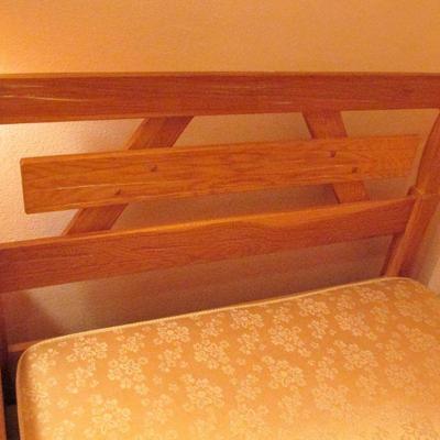 A Brandt Ranch Oak twin bed