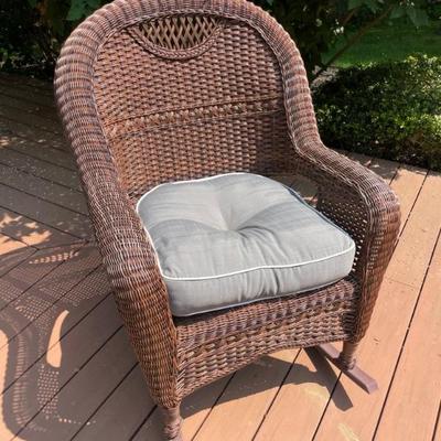 Four wicker rockers, with custom cushions