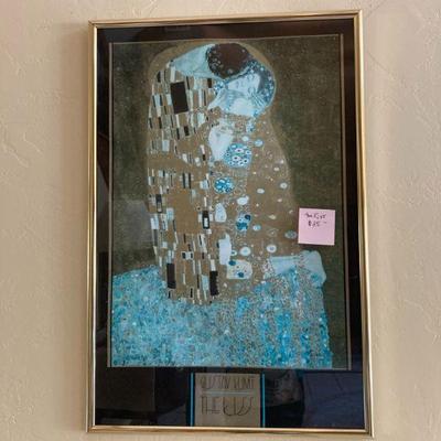 a print of "The Kiss". Gusavf Klimt
